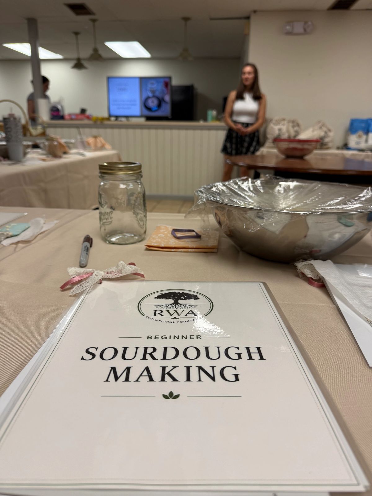 Community members learning to make sourdough together